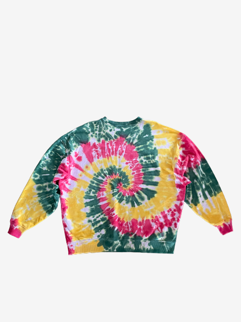 A long-sleeve crewneck sweatshirt featuring a vibrant spiral tie-dye pattern in green, yellow, red, displayed flat against a light gray background.