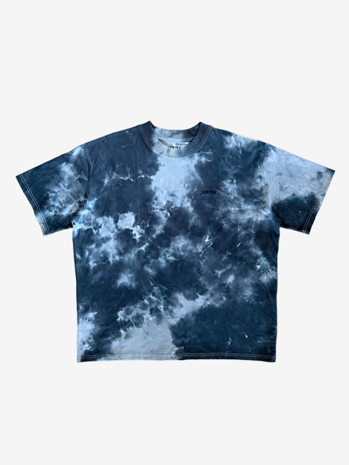 A short-sleeve oversized crewneck tie-dye t-shirt featuring a black and grey pattern, laid flat against a light gray background.