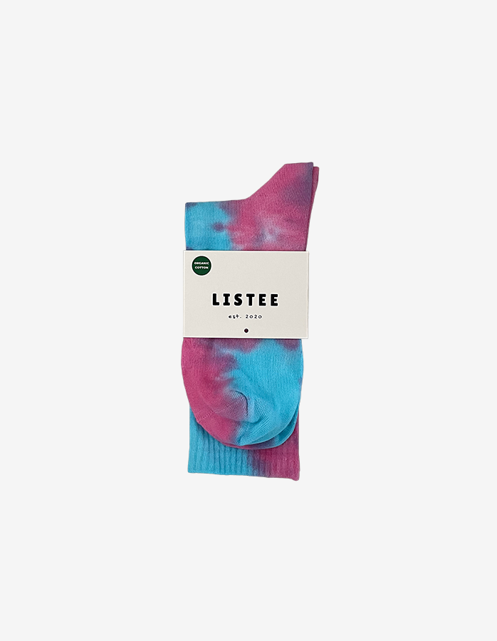 Tie-dye socks in pink and blue on a white background